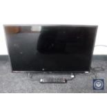 A Technika 32 inch LED TV with remote