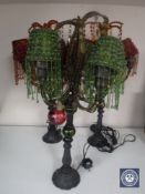Three contemporary glass and metal table lamps with beaded shades