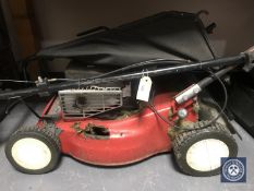 A Mountfield petrol lawn mower