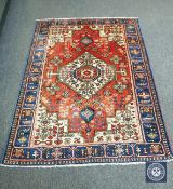 A Persian Navahand rug,