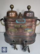 An antique copper and brass twin pot tea and coffee urn made by Matthew J Heart of Birmingham