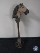 A mid twentieth century wooden hobby horse