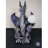 A large contemporary figural table lamp in the form of a dragon