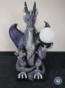 A large contemporary figural table lamp in the form of a dragon