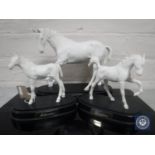 Three Royal Doulton figures - Spirit of Youth, Spring Time and Adventure, on stands.