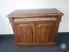 A Victorian mahogany double door bookcase base fitted a drawer