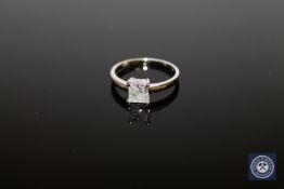 A 14ct white gold solitaire diamond ring, the princess-cut diamond weighing 0.