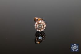 A 14ct rose gold diamond pendant, the champagne coloured central brilliant-cut diamond weighing 0.