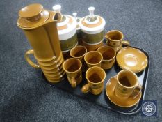 A tray of thirteen piece Carlton ware pottery coffee set together with three graduated Woods
