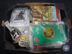 A box of assorted tea cards, Leicester rugby and football programmes,