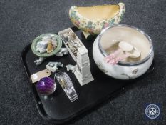 A tray of miniature cut glass desk clock, glass paperweight, London Goss cenitaph, Wade figures,