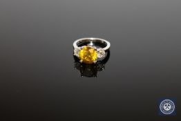 A 14ct white gold diamond three stone ring,