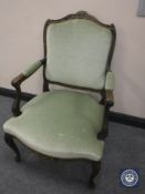 A salon armchair upholstered in green dralon