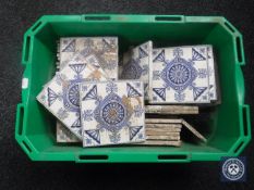 A box of blue and white fireplace tiles