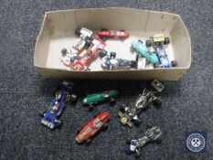 A box of eleven twentieth century die cast Corgi racing cars