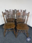 A set of four oak kitchen chairs