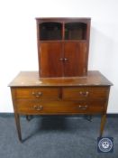 A Victorian inlaid mahogany three drawer chest together with a mahogany double door bedside cabinet