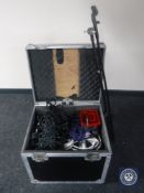 A flight case containing a large quantity of guitar and microphone cables together with a