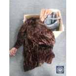 A fur coat and two boxes of leather hand bags,