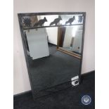 A metal framed mirror