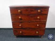 A Victorian pine five drawer chest