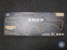 A Regimental Police SMG9 electric water pistol