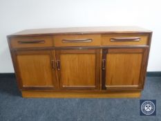 A teak G-plan triple door sideboard