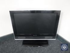 A Wharfedale 26" LCD TV with remote together with a boxed Canon Pixma printer