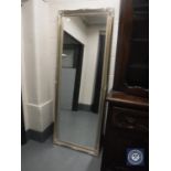 A silvered framed mirror,