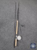 A three piece Daiwa graphite regal salmon rod together with two reels