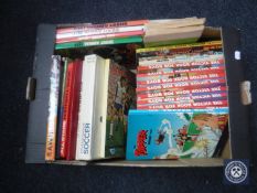A box of twentieth century annuals and books