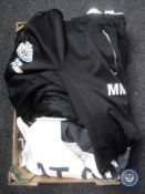 A box of Newcastle United football training clothing,