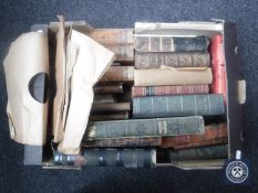 A box of antiquarian leather bound volumes