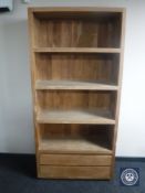 A set of contemporary Barker and Stonehouse bookshelves fitted with two drawers