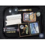 A quantity of pens including Parker, pocket watch in box, magnifying glass,
