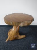 A tree stump coffee table