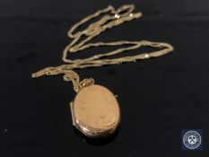A 9ct gold locket on 9ct gold chain, 4.1g.