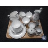 A tray of Royal Worcester Interlude tea service together with a china floral jug and miniature