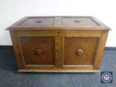 An early twentieth century oak blanket chest