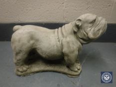 A composition garden figure of a bulldog,