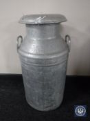 An aluminium milk churn