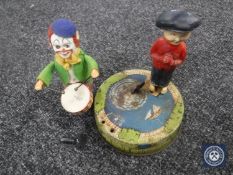Two early twentieth century tin plate toys - Drumming clown and fishing boy (no rod)