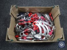 A box of assorted carabiner clips