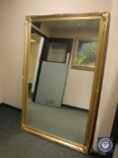 A traditional style mirror in gilt frame,
