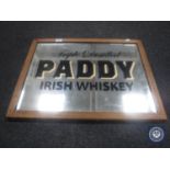 A 20th century mirror bearing "Paddy Irish Whiskey" advertising