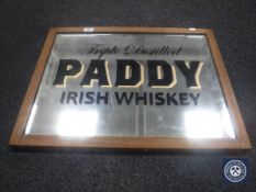 A 20th century mirror bearing "Paddy Irish Whiskey" advertising
