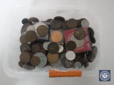 A tub containing pre-decimal British coinage,