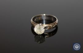 An 18ct white gold diamond solitaire ring, the brilliant-cut stone weighing 1.