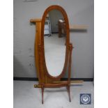 A pine cheval mirror together with a headboard