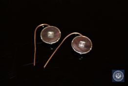 A pair of 10ct rose and white gold diamond earrings,